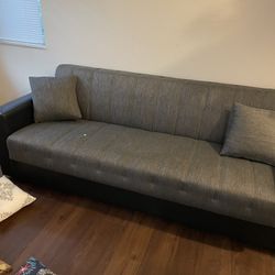 Futon. Grey Upholstery 