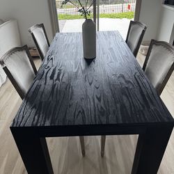 Black modern dining table + Restoration Hardware Chairs