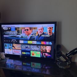 LG 55’ Flat Screen TV W/Roku Remote