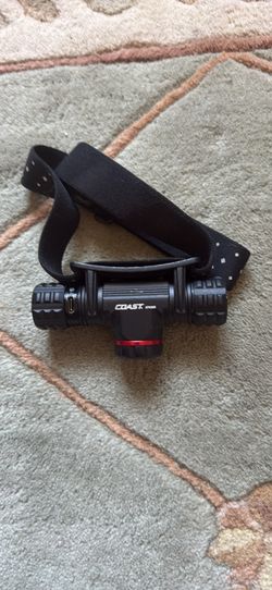 Coast XPH30R rechargeable LED headlamp.