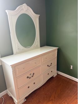 White 6- draw dresser with oval mirror.