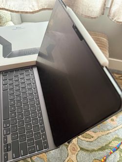 iPad Pro with Magic Keyboard/pro pencil (will trade for MacBook Air 15 in)