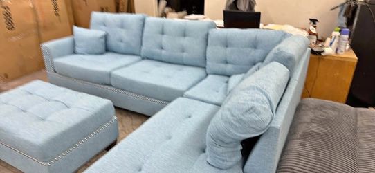 New Reversible Nailhead Sectional.  Light Blue.  104” X 75”.  Free Delivery!
