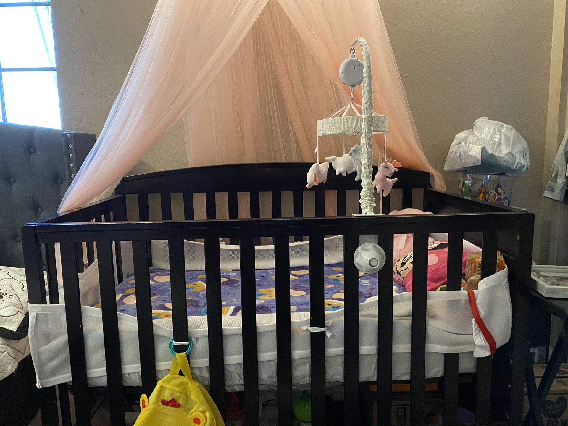 Baby crib with changing table