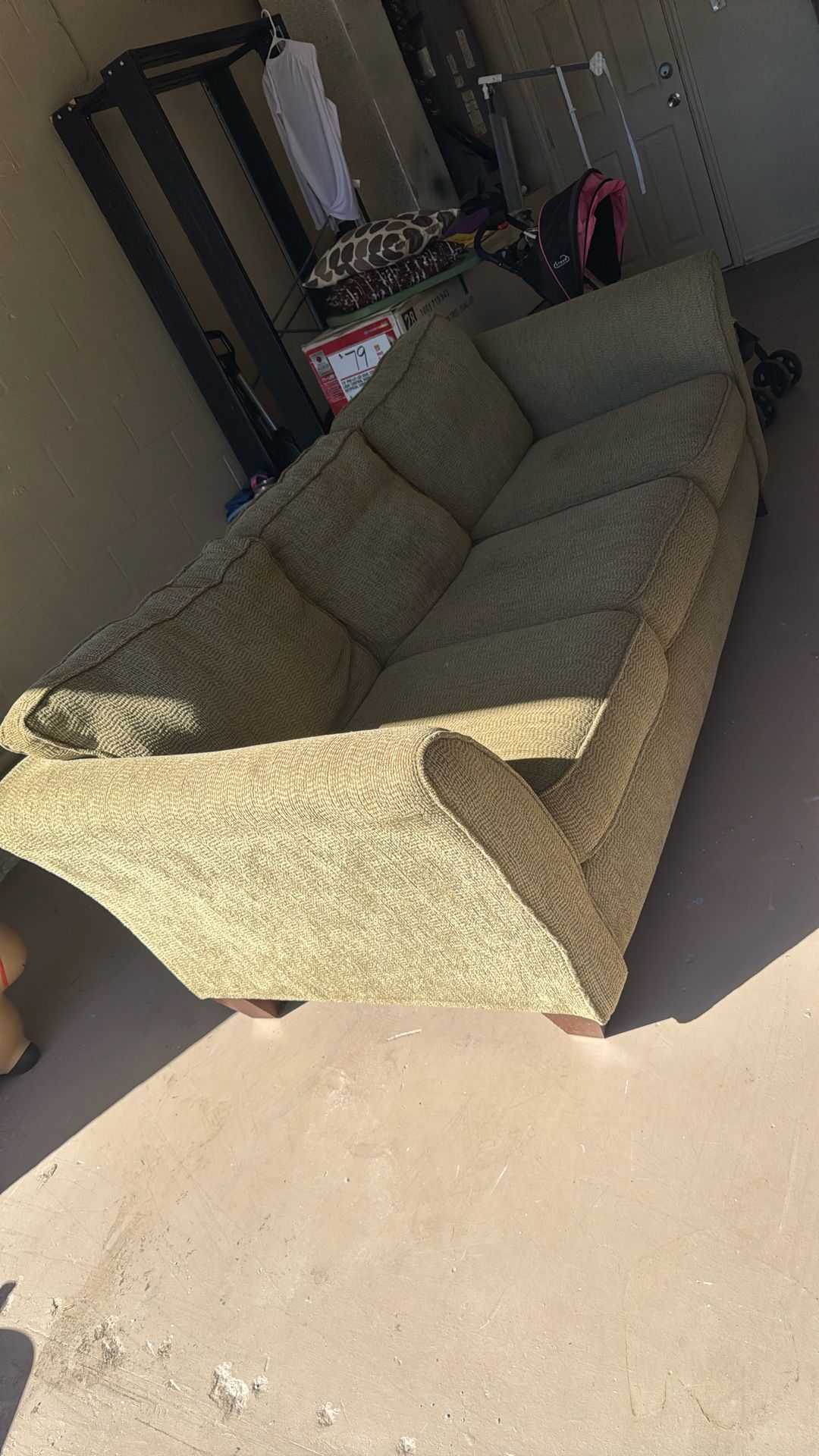 OLIVE GREEN PULL OUT COUCH