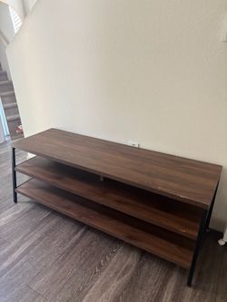 Entertainment center shelf