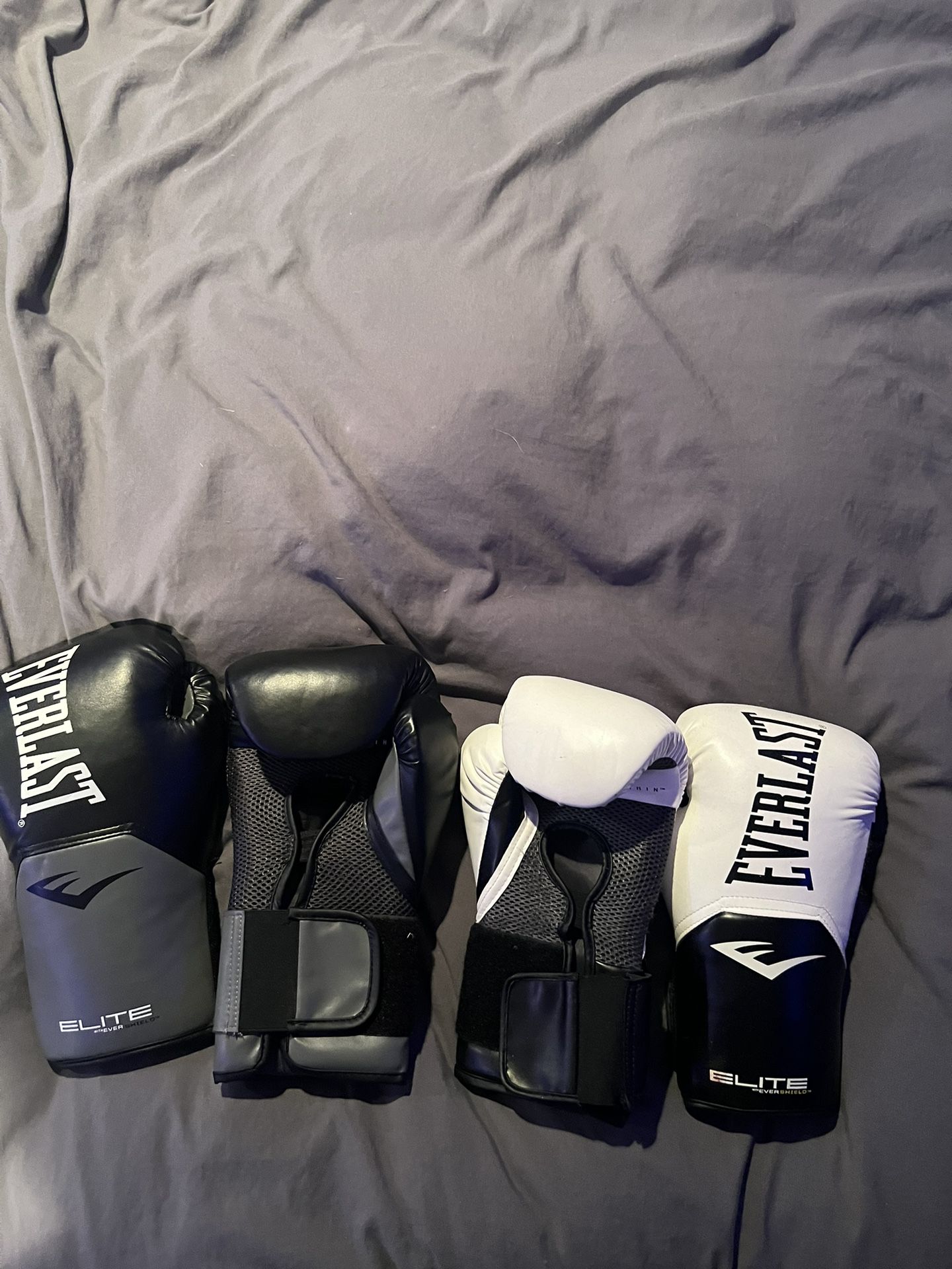 Two Pairs Of Boxing Gloves 