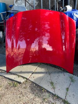 1(contact info removed) HOOD RED CAMARO Z28