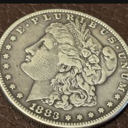 $1 1883. Morgan Dollar Ag. 0.900