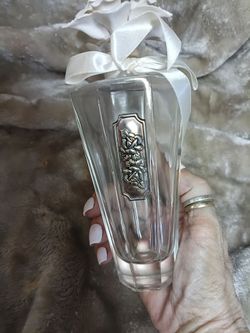 Three Antique 1930's Cellini Handcrafted Crystal perfume bottles all with porcelain rose bouquet toppers made in Italy. Three sizes.
