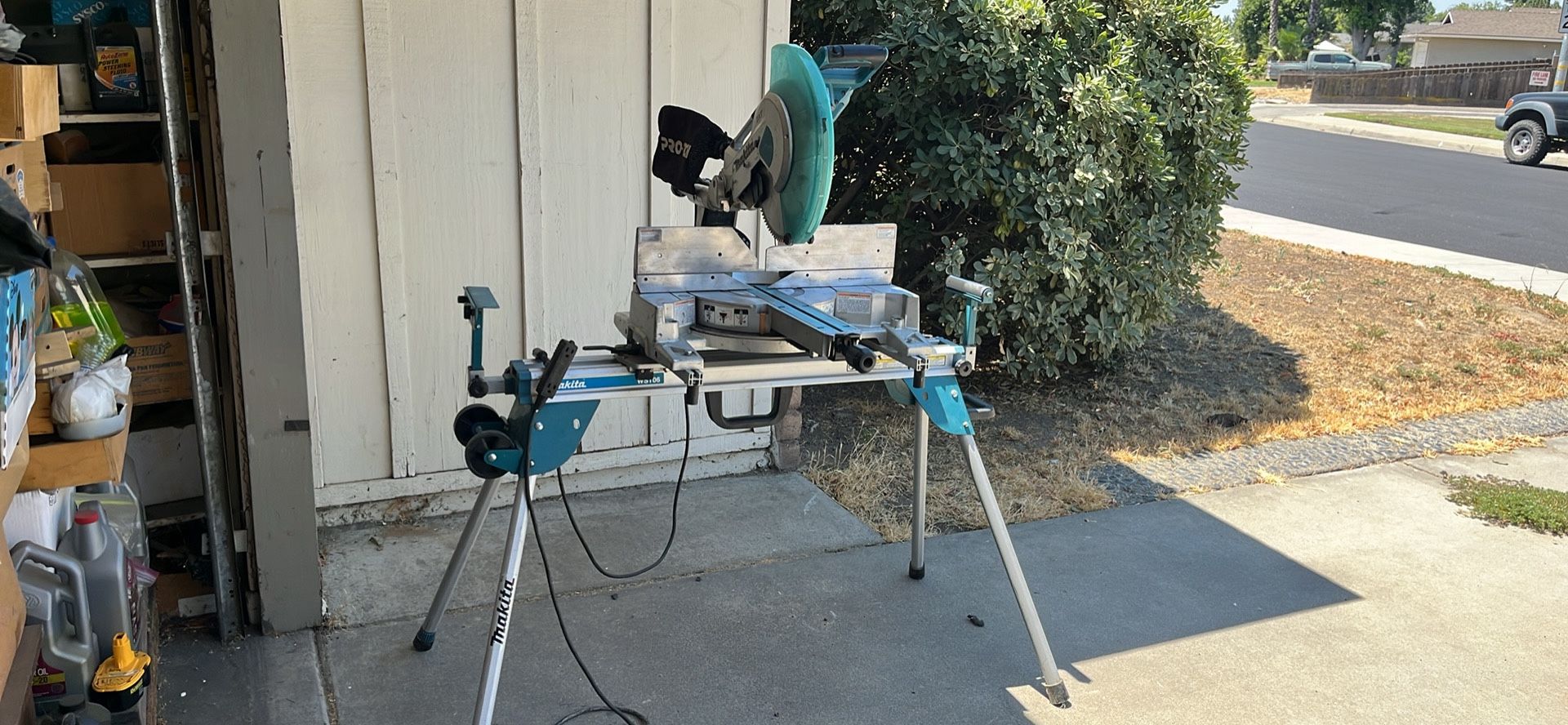 $400 FIRM NO OFFERS 12” MAKITA MITER SAW WITH STAND $400 FIRM NO OFFERS