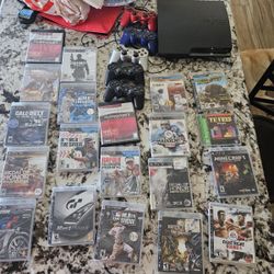 PS3 With LOTS of Games And Extra Controllers