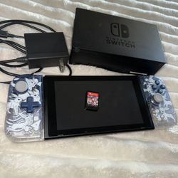 Nintendo Switch W/pokemon Joycons 