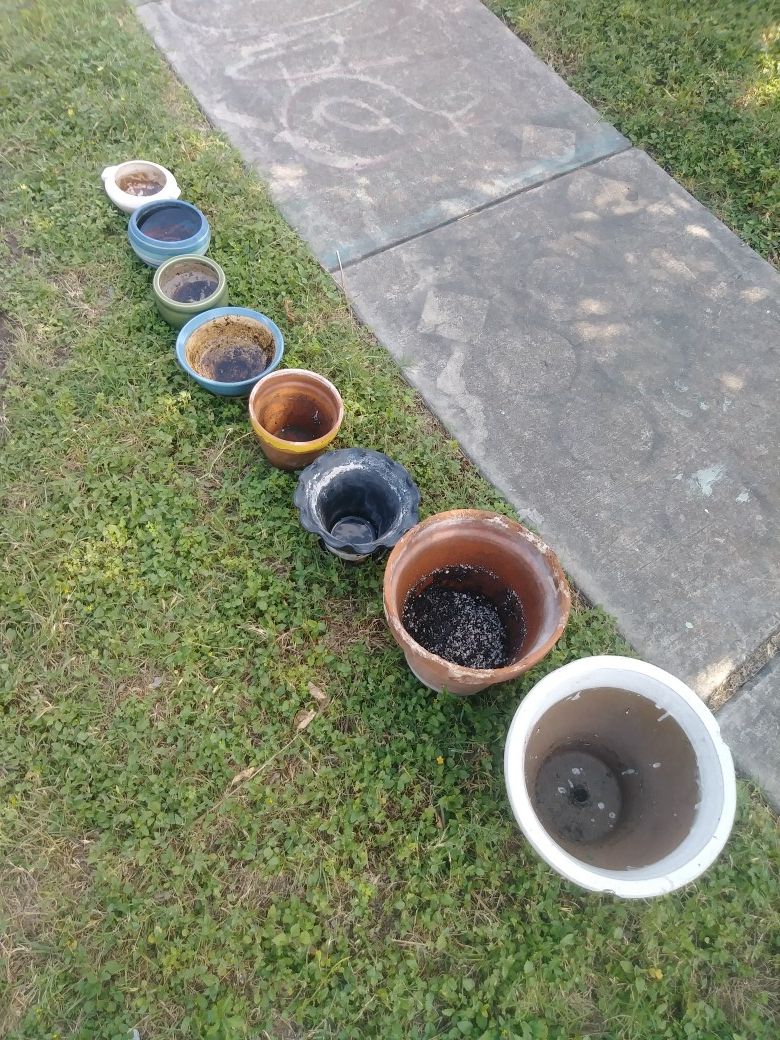 8 small to medium flower pots $20 for all