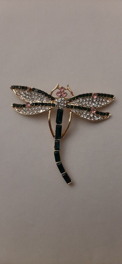 Dragonfly brooch with green stone crystal