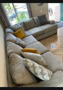 Beautiful Sectional couch from Jerome’s super Comfortable