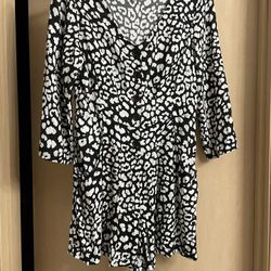 Like new adorable black and white size small women’s romper with pockets. Worn once. Smoke free home