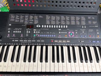 Yamaha PSR-410 Electric Keyboard with Scissor type stand