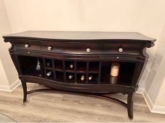 Dark wood buffet with wine storage