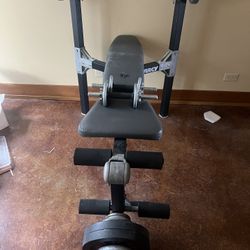 Adjustable Bench Press , EZ Curl bar, and weights 