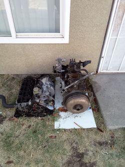 Disassembled Car Engine Block with Parts
