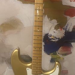 1980’s Gold body Guitar with leather Kramer case