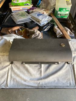 Glove box door of a 1955 Ford Fairlane.