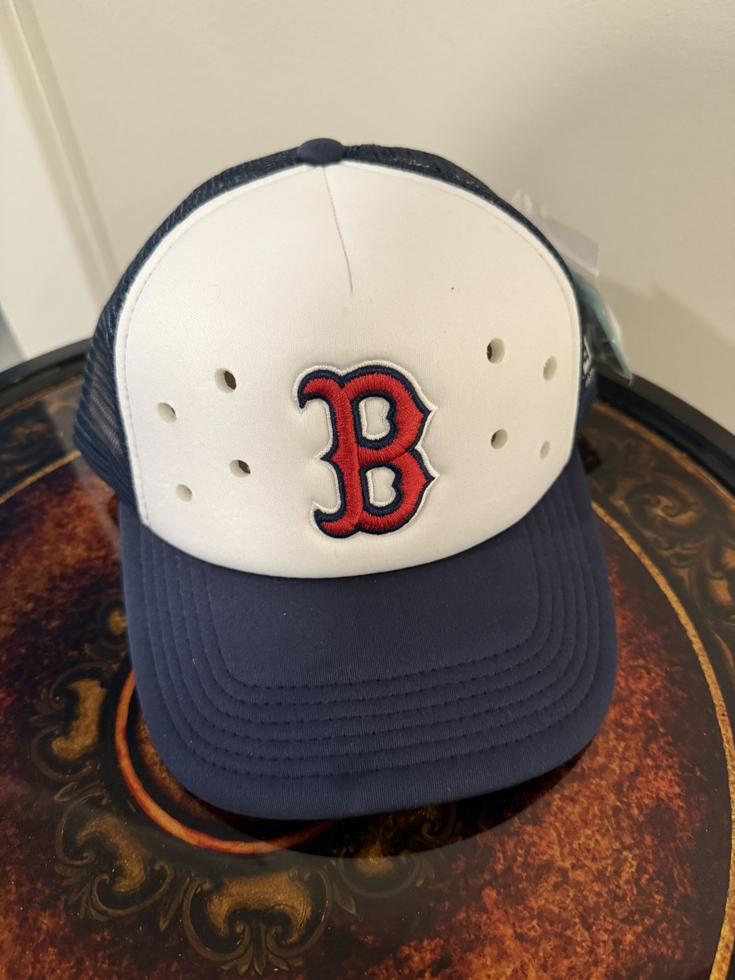 Boston Red Sox baseball cap with tags and pegs for the hat