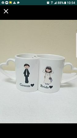 Attached Groom & Bride mugs with heart shaped handles
