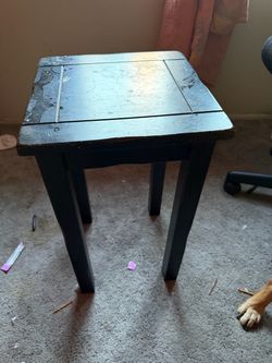 BLACK TABLE 12"w x 12"deep x 14"tall; cross streets are Arapaho & Waterview