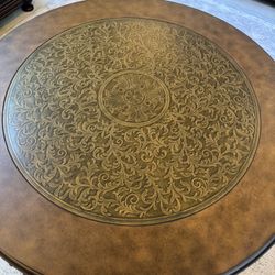 Round  Coffee Table With Lots Of Details  