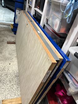 4 doors. 3 heavy  wood interior doors and one warehouse-type metal door