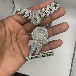 iced out cuban link chain and pendant