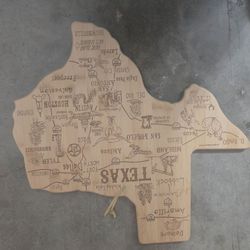 Design: Expertly crafted into the shape of Texas, featuring detailed, laser-engraved artwork that highlights major cities, landmarks, and sights acros