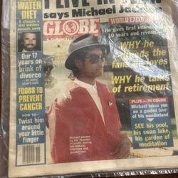 MICHEAL JACKSON ON THE COVER WITH OF GLOBE 