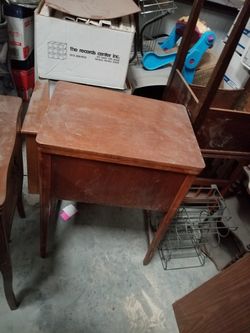 Wood grain sewing machine cabinet