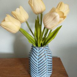 Artificial Yellow Tulips In A Ceramic Vase