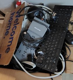 Two boxes full of computer stuff