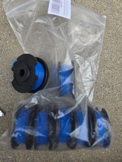 7 Weedwacker spools with cap