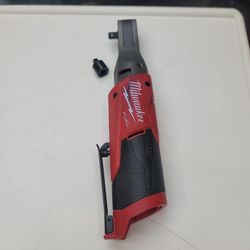 Used Milwaukee M12 Fuel 3/8" Ratchet  A2557-20 with a 3/8" to 1/4" adaptor  ( tool only) 