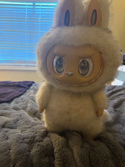 Labubu angel in clouds