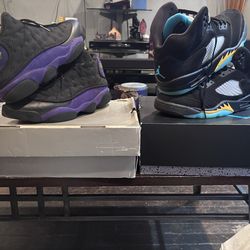 Jordan’s aqua 5s and Jordan 13 black and purple
