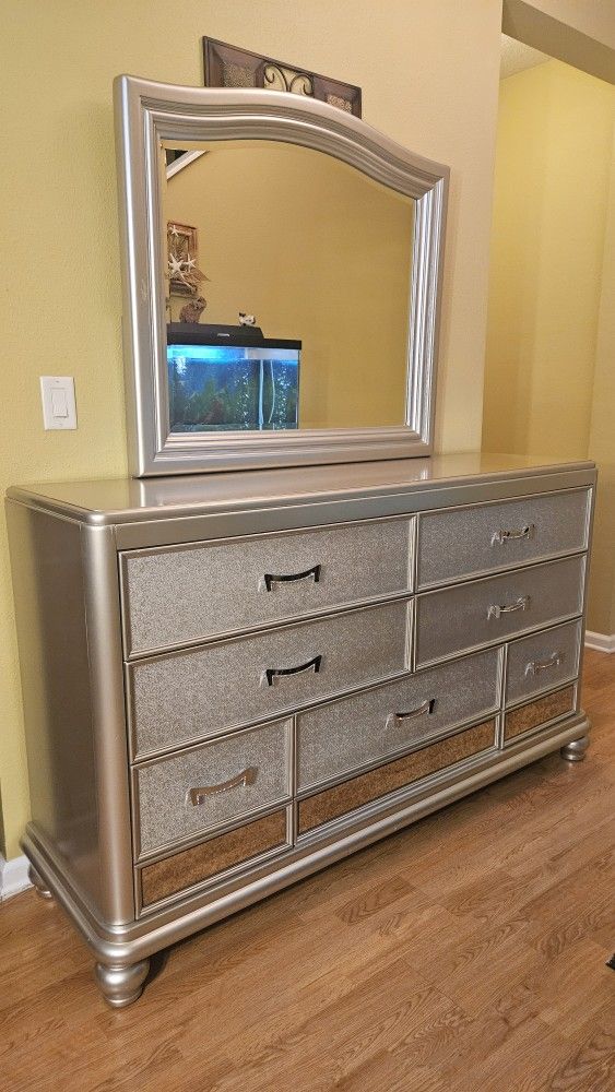 Clean and Nice Gold 7 Drawer Dresser and Mirror.