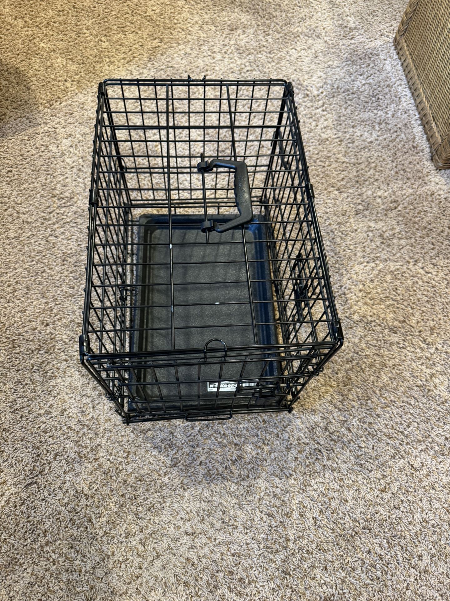 Brand New black, folding metal dog crate K-9 Keeper model. Size 19” x 13” x 16”q