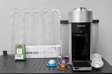 Nespresso Silver Vertuo Evoluo Coffee & Espresso Machine with Extras!