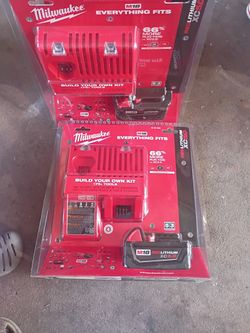 Milwaukee  Xc5ah Battery & Charger .