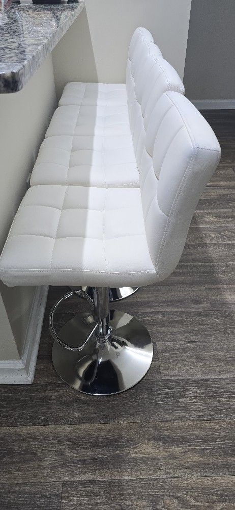 Adjustable Bar Stool.