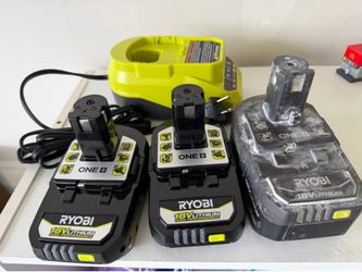 Three Ryobi batteries with charger