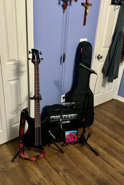 Bass guitar with everything as pitched guitar stand not included .... Selling as is. non-negotiable.. 250$ firm....
