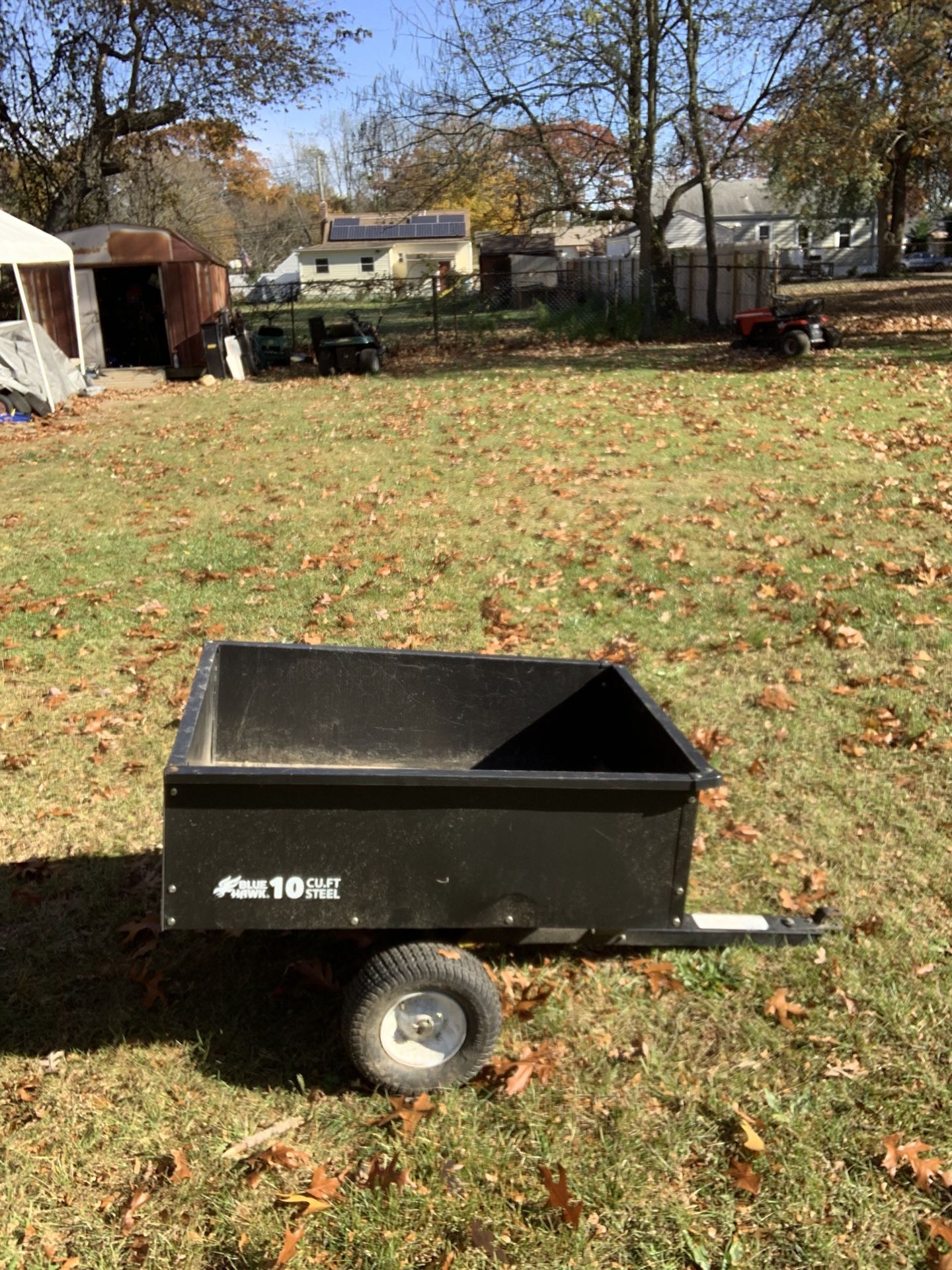 Tow behind dump wagon